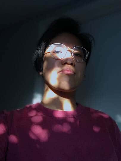 <b>Quyên Nguyen-Le</b> (Emerging, Orange) - Quyên Nguyen-Le is a queer vietnamese filmmaker born in California to refugee parents. Quyên's film work - spanning scripted, experimental and documentary formats - focuses on the ways histories are deeply felt in the quotidian everyday.