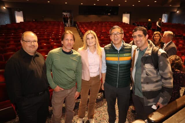 Five guests smile for the camera before the beginning of the Creative Edge Lecture